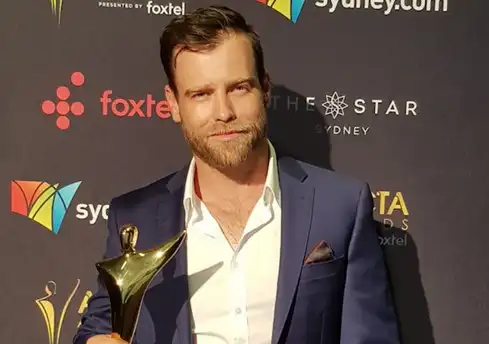 Judd Wild accepting his AACTS award
